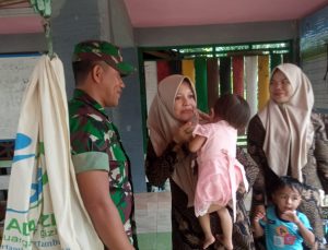 Peduli Akan Kesehatan Masyarakat, Sertu Said Ali Dampingi Giat Posyandu Balita
