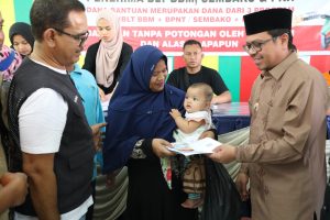 Hadiri Penyerahan Bansos, Ini Pesan Pj Bupati Aceh Utara