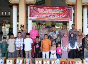 HUT Ke-77 Bhayangkara, Polres Aceh Utara Salurkan Ratusan Paket Bansos