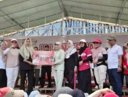 Yesi Andriani Warga Desa Banyumas, Dapat Hadiah Undian Umrah Gratis Jalan Sehat Wisata Gembira Candipuro