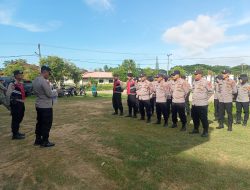 Puluhan Personel Polres Aceh Utara Amankan Penyortiran dan Pelipatan Surat Suara